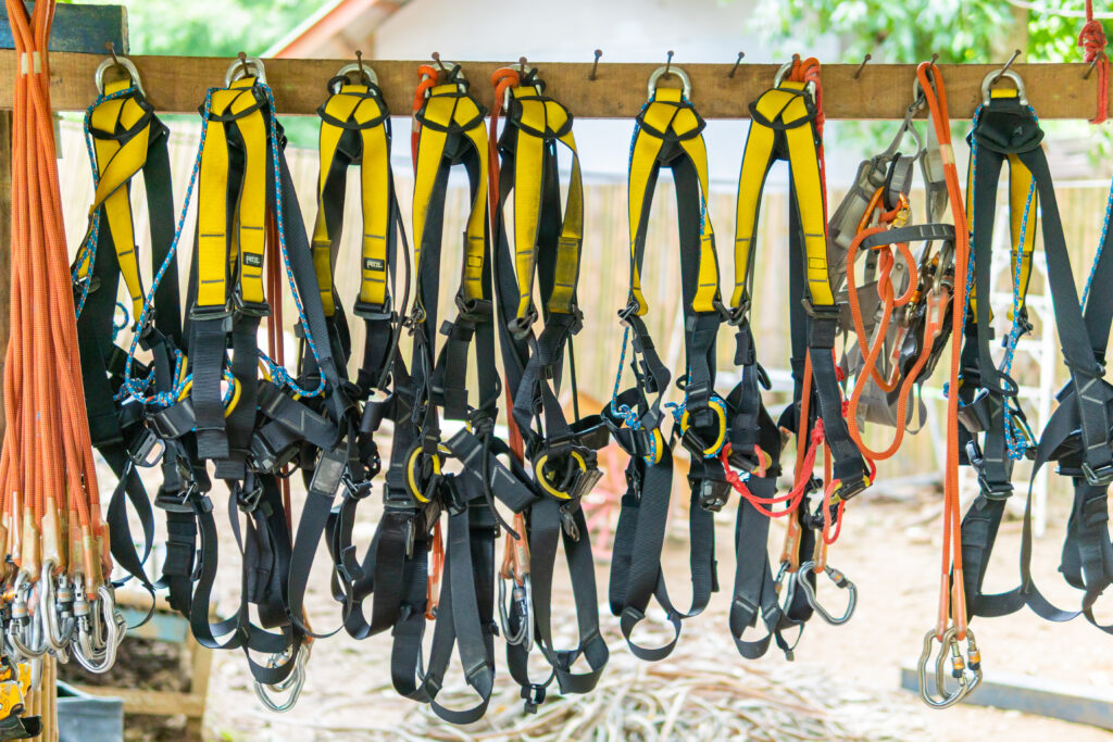 A rack of professional safety harnesses is not something you would see on a DIY roof repair job site.)
